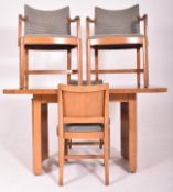 HEAL'S OF LONDON - ART DECO OAK DINING TABLE AND FOUR CHAIRS
