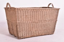 LARGE CONTINENTAL EARLY 20TH CENTURY WICKER LOG BASKET