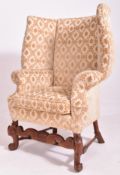 GEORGE III MAHOGANY FRAMED WING-BACK FIRESIDE ARMCHAIR