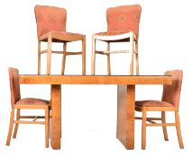 EARLY 20TH CENTURY ART DECO FIGURED WALNUT DINING SUITE