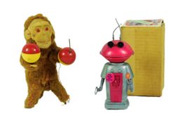 TWO VINTAGE CLOCKWORK MECHANICAL TOYS