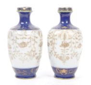 PAIR OF JAPANESE CHINA VASES WITH HALLMARK SILVER COLLARS