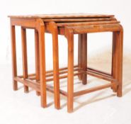 20TH CENTURY NEST OF TABLES WITH CARVED DETAILING