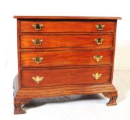 GEORGE II REVIVAL MAHOGANY SERPENTINE CHEST OF DRAWERS