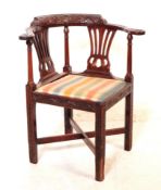 19TH CENTURY CARVED MAHOGANY CORNER ARMCHAIR