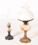 TWO VICTORIAN CAST IRON OIL LAMPS