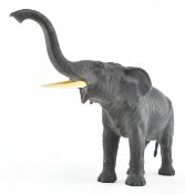 A JAPANESE MEIJI PERIOD BRONZE ELEPHANT FIGURINE