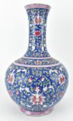 BLUE GROUND EMAMELLED BOTTLE VASE 蓝底粉彩番莲天球瓶