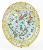 QING DYNASTY POLYCHROME ENAMELLED PLATE 清 珐琅彩花穿龙纹盘