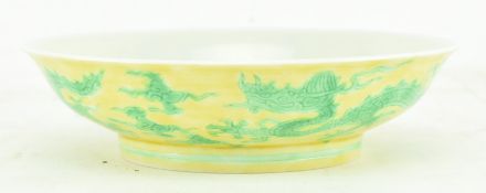 YELLOW-GROUND GREEN-ENAMELLED 'DRAGON' SAUCER 黄底绿彩云龙纹碟
