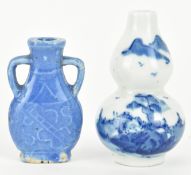 TWO QING DYNASTY CERAMIC SNUFF BOTTLES 清 青花鼻烟壶和蓝釉鼻烟壶
