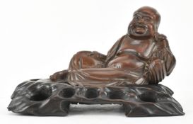 REPUBLICN WOODEN CARVED FIGURINE OF A BUDDHA 民国实刻卧佛连座