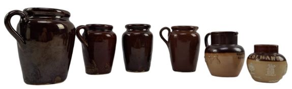 VINTAGE ADVERTISING. COLLCETION OF FOUR STONEWARE JUGS & COLMAN'S POT