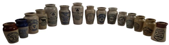 VINTAGE ADVERTISING. COLLECTION OF FIFTEEN STONEWARE CREAM JUGS, NAMED