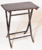 EARLY 20TH CENTURY EBONISED FOLDING CAMPAIGN TABLE