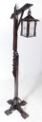 20TH CENTURY OAK FLOOR STANDING LANTERN