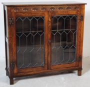 JAYCEE - 20TH CENTURY JACOBEAN REVIVAL OAK BOOKCASE