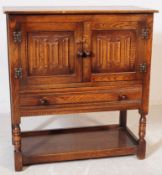 JAYCEE - 20TH CENTURY JACOBEAN REVIVAL OAK CUPBOARD