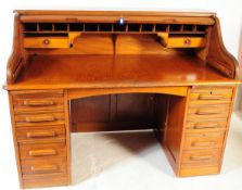 EARLY 20TH CENTURY OAK TAMBOUR FRONT DESK