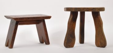 TWO EARLY 20TH CENTURY OAK MILKING JOINT STOOLS