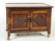 20TH CENTURY JACOBEAN REVIVAL OAK CUPBOARD