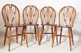 SET OF FOUR LATE 20TH CENTURY OAK WHEEL BACK DINING CHAIRS
