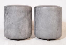 PAIR OF CONTEMPORARY GREY FAUX LEATHER POUFFE STOOLS