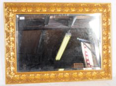 CONTEMPORARY GILT VINE & LEAF FRAME OVER MANTEL MIRROR