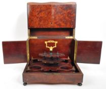 EARLY 20TH CENTURY MAHOGANY BELL FOUR DECANTER TANTALUS