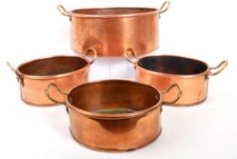 COLLECTION OF FOUR 20TH CENTURY OVAL COPPER PANS / PLANTERS