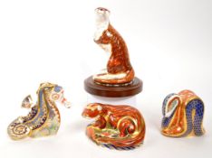 ROYAL CROWN DERBY - FOUR ANIMAL PAPERWEIGHTS INCL. PLAYFUL OTTER