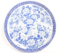 LARGE EARLY 20TH CENTURY BLUE & WHITE CERAMIC CHARGER