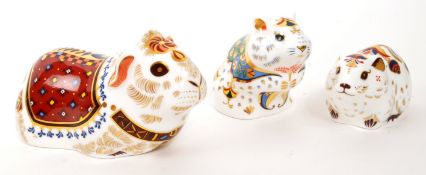 ROYAL CROWN DERBY - THREE PAPERWEIGHTS INCL. GUINEA PIG