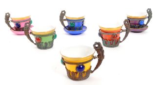 COLLECTION OF ART NOUVEAU STYLE PORCELAIN CUPS & SAUCERS
