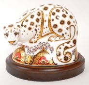 ROYAL CROWN DERBY - SNOW LEOPARD PAPERWEIGHT WITH PLINTH