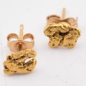 PAIR OF YELLOW METAL STUD EARRINGS