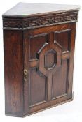 1920S JACOBEAN REVIVAL OAK CORNER CABINET