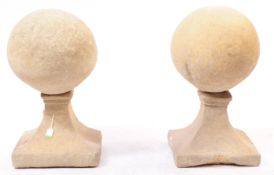 PAIR OF 20TH CENTURY STONE COMPOSITE GARDEN ORNAMENTS