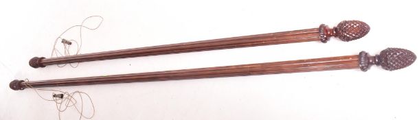 PAIR OF VINTAGE 20TH CENTURY PINEAPPLE FINIAL CURTAIN POLES