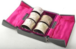 COLLECTION OF EARLY 20TH CENTURY SILVER PLATE NAPKIN RINGS