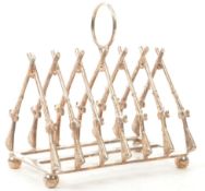 EARLY 20TH CENTURY SILVER PLATED GUN / RIFLE TOAST RACK