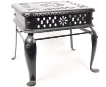 19TH CENTURY VICTORIAN IRON FOOTMAN WITH PIERCED DETAILING