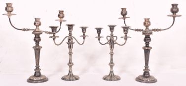 TWO PAIRS OF HIGH VICTORIAN SILVER PLATED CANDELABRAS