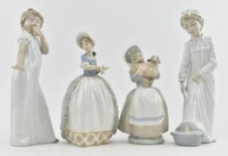 NAO - FOUR FINE BONE CHINA FIGURINES OF GIRLS IN DRESSES