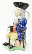 18TH TO EARLY 19TH CENTURY STAFFORDSHIRE WILLIAM KENT TOBY JUG