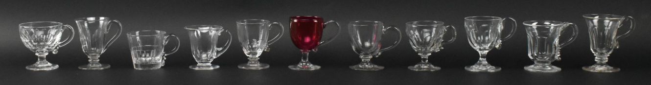 ELEVEN LATE GEORGE III EARLY VICTORIAN GLASS CUSTARD CUPS