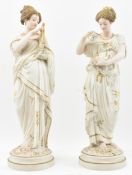 PAIR OF BELIEVED ROYAL WORCESTER PAINTED BISQUE FEMALE FIGURES