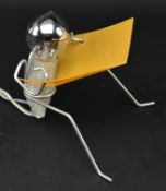 BLACK & BLUM - CONTEMPORARY DESK LAMP IN THE SHAPE OF READING FIGURE