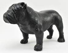 CONTEMPORARY KITSCH BLACK PAINTED PLASTER FIGURE OF BULLDOG