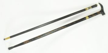 TWO 19TH CENTURY WALKING STICKS WITH CONCEALED BLADES